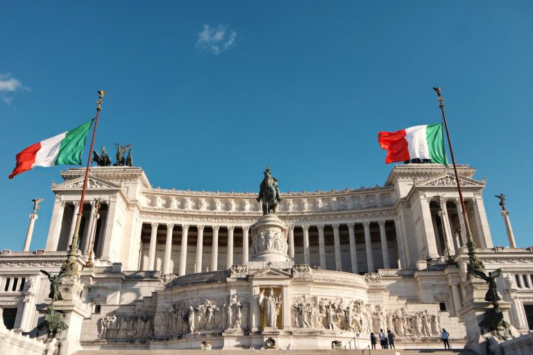 Piazza Venezia in Rome — the Vittoriano monument with Italian flags