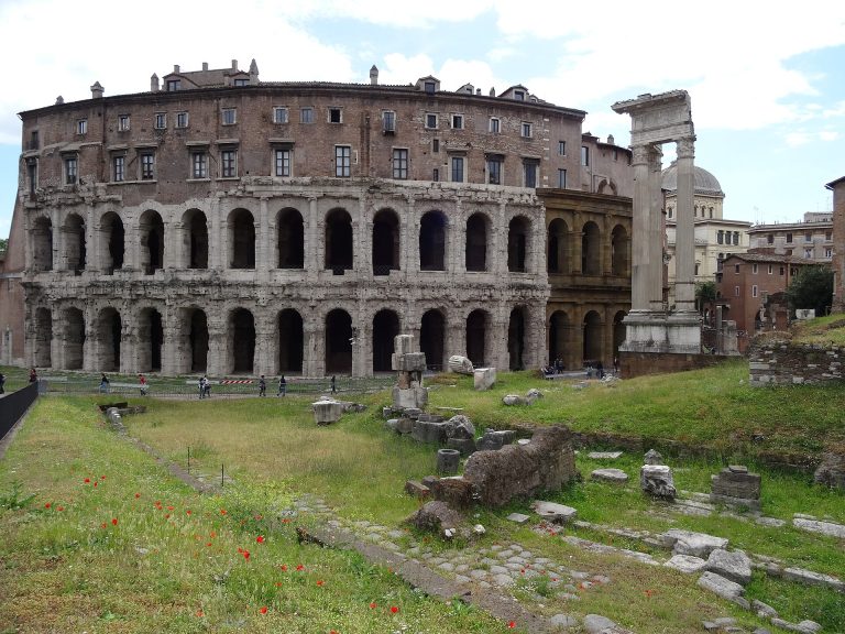 The Theatre of Marcellus in Rome — tiers of arches and the columns of the temple of Apollo