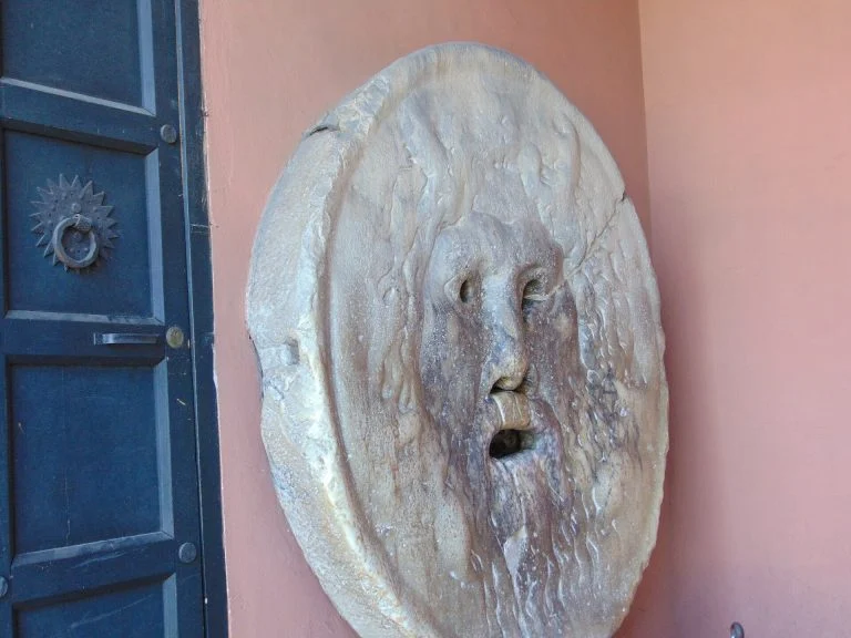 The Mouth of Truth in Rome — the marble mask by the church of Santa Maria in Cosmedin