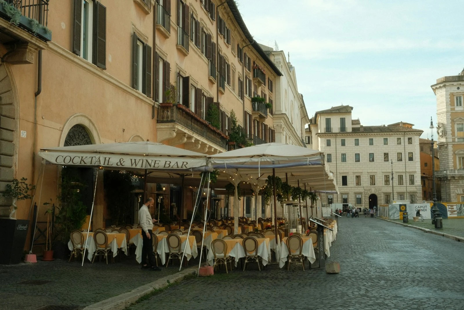 A restaurant terrace on a Roman square